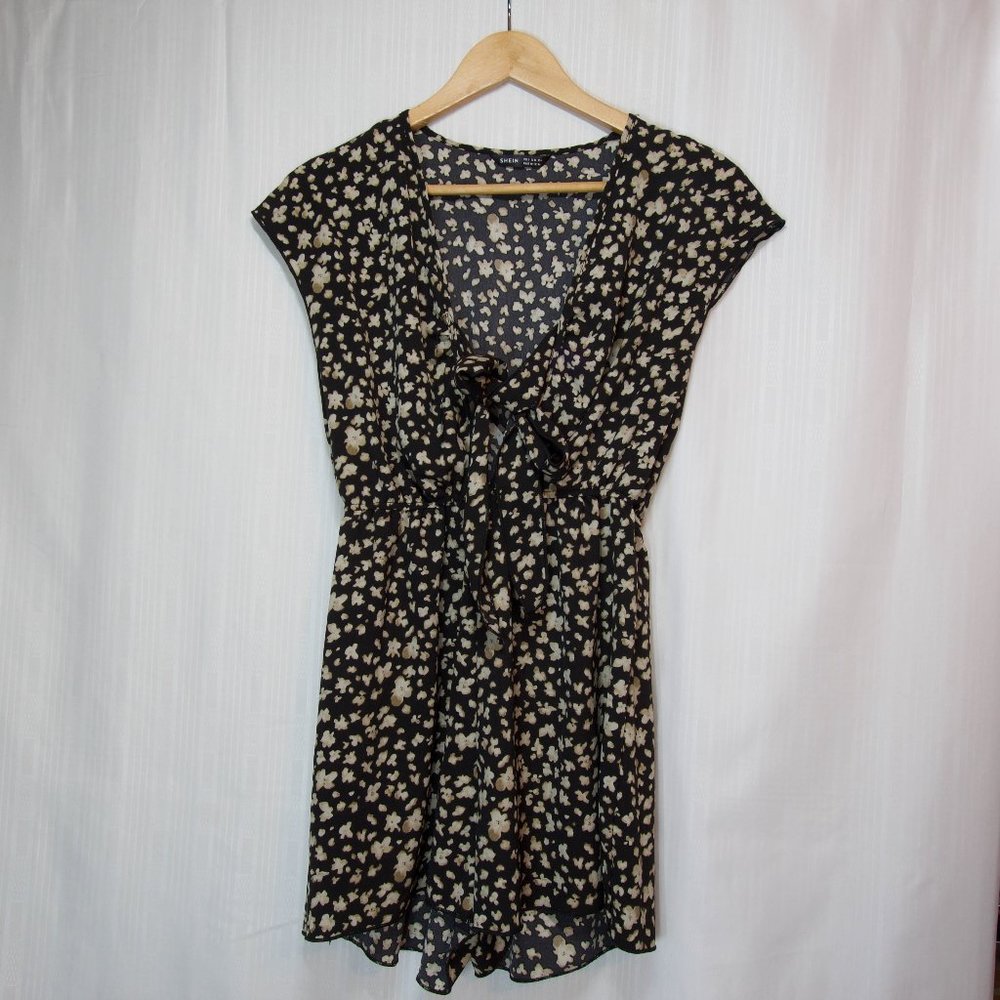 Back Romper with Tan Floral Pattern Size Small